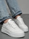 Кросівки білого кольору на шнурівці | 6769274 | фото 2