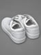 Кросівки білого кольору на ліпучці та шнурівці | 6769500 | фото 3