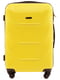 Середня жовта дорожня пластикова валіза на 4-х колесах (62 л) | 6766988 | фото 2