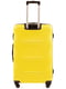 Середня жовта дорожня пластикова валіза на 4-х колесах (62 л) | 6766988 | фото 3