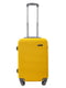 Маленька пластикова валіза жовтого кольору на 4-х колесах | 6767532