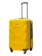 Пластикова валіза середнього розміру жовтого кольору на 4-х колесах | 6767761 | фото 2