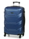Пластикова валіза синього кольору середнього розміру на 4-х колесах | 6768064
