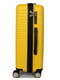 Поліпропіленова валіза середнього розміру жовтого кольору на 4-х колесах | 6768114 | фото 4