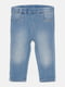 Светло-синие джинсы с потертостями | 6774628