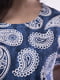 Синя сукня А-силуету з принтом і кишенями | 6780455 | фото 2