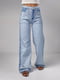 Блакитні джинси-кльош з лампасами та накладними кишенями | 6781042 | фото 7