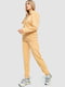 Трикотажний світло-бежевий костюм: худі з малюнком та джогери | 6782034 | фото 3