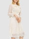 Кремова ажурна сукня А-силуету із зав'язкою та оборками на ліфі | 6782057 | фото 3