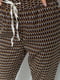 Принтованые коричнево-горчичные брюки с карманами | 6782123 | фото 5