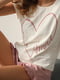Трикотажна піжама: футболка з принтом та шорти з оборками | 6774051 | фото 5