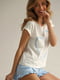 Трикотажна піжама: футболка з принтом та шорти з оборками | 6774052 | фото 3