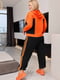 Костюм оранжево-чорний: худі та штани | 6789566 | фото 4