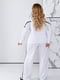 Белый костюм з лампасами: свитшот и брюки свободного кроя | 6796582 | фото 4