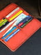Кожаный кошелек-клатч на 12 карт красного цвета | 6798021 | фото 4