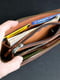 Кожаный кошелек-клатч шоколадного цвета на круговой молнии с ремешком | 6799019 | фото 3
