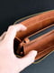 Кожаный черный кошелек-клатч на круговой молнии с ремешком | 6799021 | фото 2