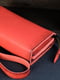 Шкіряний гаманець-клатч коралового кольору з ремінцем | 6799157 | фото 2