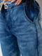 Сине-голубые джинсовые джогеры с потертостями | 6801301 | фото 4