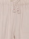 Светло-бежевые брюки с манжетами на резинке | 6802043 | фото 3