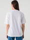 Трикотажна біла футболка з яскравим принтом | 6803374 | фото 5