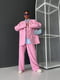 Рожевий оверсайз костюм: жакет без підкладки та штани-палаццо | 6803840