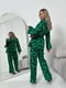 Зелений костюм анімалістичного забарвлення: жакет з поясом та штани | 6803948 | фото 4