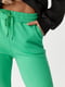 Трикотажні штани-джогери салатового кольору з начосом | 6805138 | фото 4