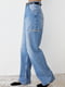 Сині джинси з декоративними розрізами на стегнах | 6805576 | фото 2