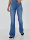 Сині джинси-кльош з круглою кокеткою позаду | 6805601 | фото 5