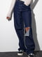 Двосторонні рвані блакитні джинси у стилі grunge | 6805610 | фото 7