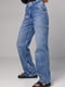 Сині джинси з декоративними розрізами на стегнах | 6805618 | фото 6