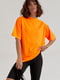 Чорно-помаранчевий костюм: футболка, велосипедки та портупея | 6805703 | фото 5