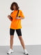 Чорно-помаранчевий костюм: футболка, велосипедки та портупея | 6805703 | фото 6