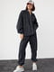 Теплий чорний костюм в техніці тай-дай: толстовка та джогери | 6805707 | фото 5