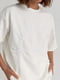Трикотажний білий костюм: шорти та футболка з вишивкою | 6805803 | фото 3