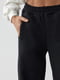 Утеплені трикотажні штани чорного кольору | 6806927 | фото 4
