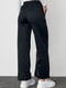 Чорні трикотажні штани на флісі з накладними кишенями | 6806943 | фото 2