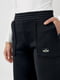 Чорні трикотажні штани на флісі з накладними кишенями | 6806943 | фото 4