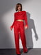 Червоний костюм з паєтками: блуза з пір'ям на рукавах та штани | 6807161 | фото 8