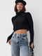 Укорочений чорний светр з рельєфною горловиною та рукавами | 6807250 | фото 6