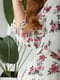 Елегантна молочна сукня А-силуету в квітковий принт з поясом | 6809855 | фото 6