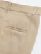 Зауженные бежевые брюки со складками | 6811918 | фото 2
