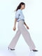 Свободные светло-бежевые брюки с акцентными швами | 6811989 | фото 2