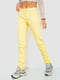 Желтые зауженные брюки | 6810264 | фото 3