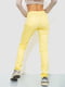 Желтые зауженные брюки | 6810264 | фото 4