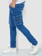 Синие джинсы с потертостями и накладными карманами | 6812521 | фото 3