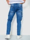 Синие джинсы с потертостями и накладными карманами | 6812523 | фото 4