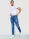 Сині джинси з потертостями та кишенями на молії | 6812524 | фото 2