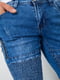 Синие джинсы с потертостями и карманами на молии | 6812524 | фото 5
